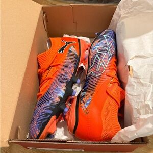 Puma Vibrant Orange and Purple Cleats
